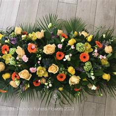 Colourful Rose and Orchid Casket Spray